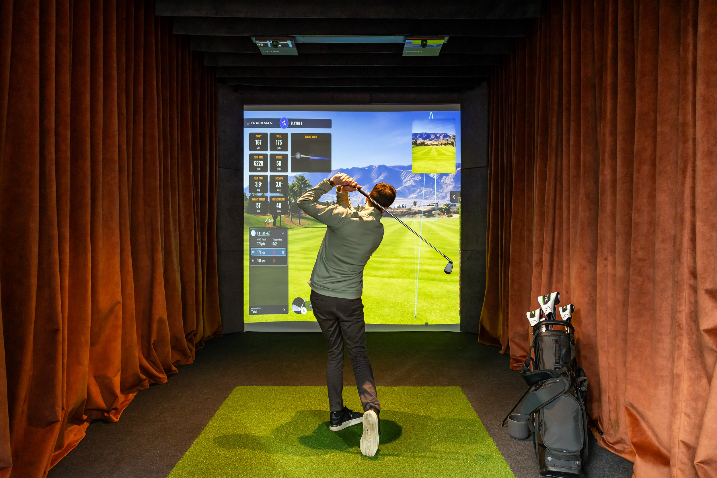 Playing golf at Pitch Manchester